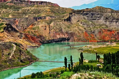 A river among the mountains in the daytime